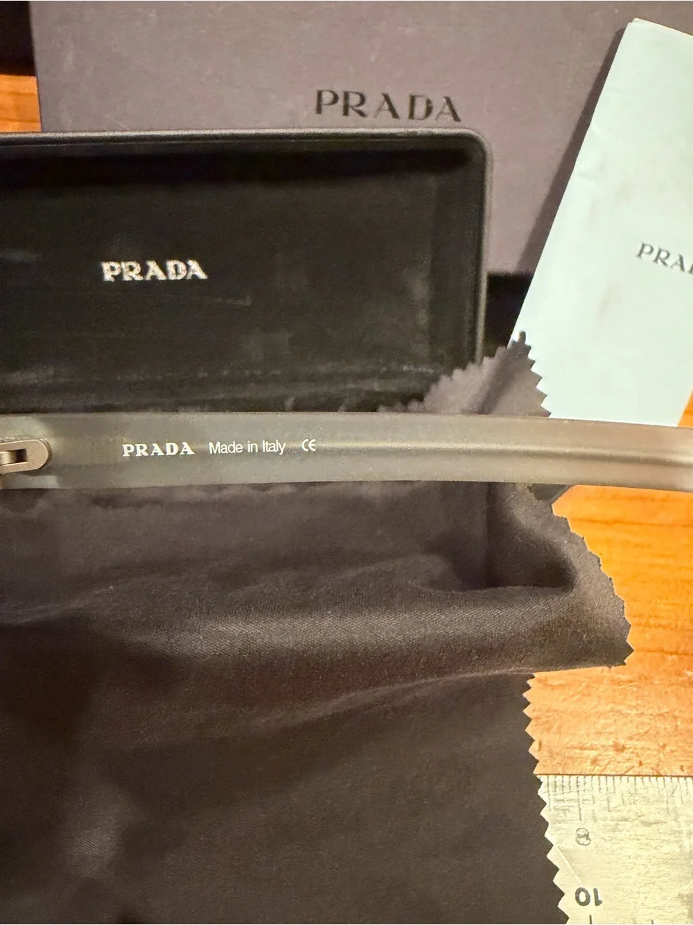 Prada Kids Oval Sunglasses in Light Gray with Dark Lenses